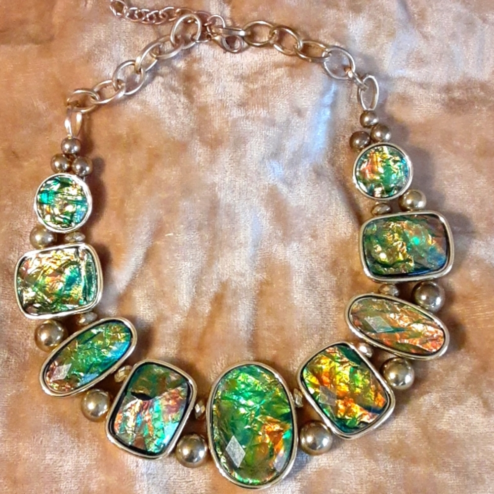 Vintage faux ammonite lucite necklace, gold tone metal.